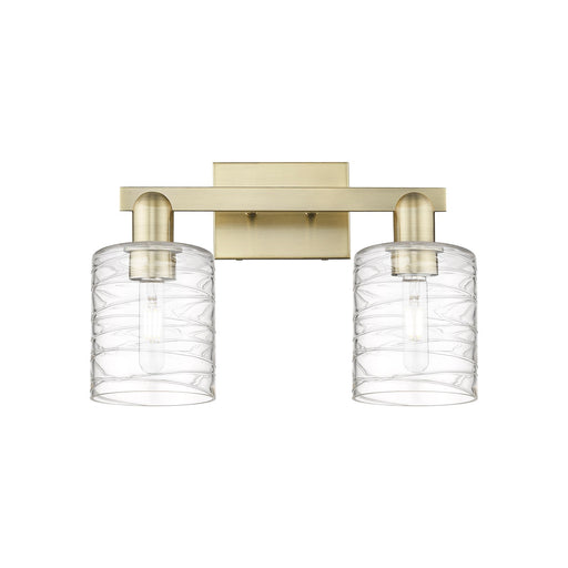 Innovations Cobbleskill 16in 2-Light Bath Vanity Light | Industrial Antique Brass Steel and Deco Swirl Clear Glass | Bathroom | Model 716-2W-AB-G1113