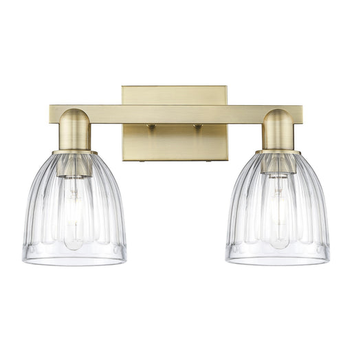 Innovations Brookfield 17in 2-Light Bath Vanity | Industrial Antique Brass and Clear Ribbed Glass | Bathroom Vanity Light | 16.75 x | Model 716-2W-AB-G442