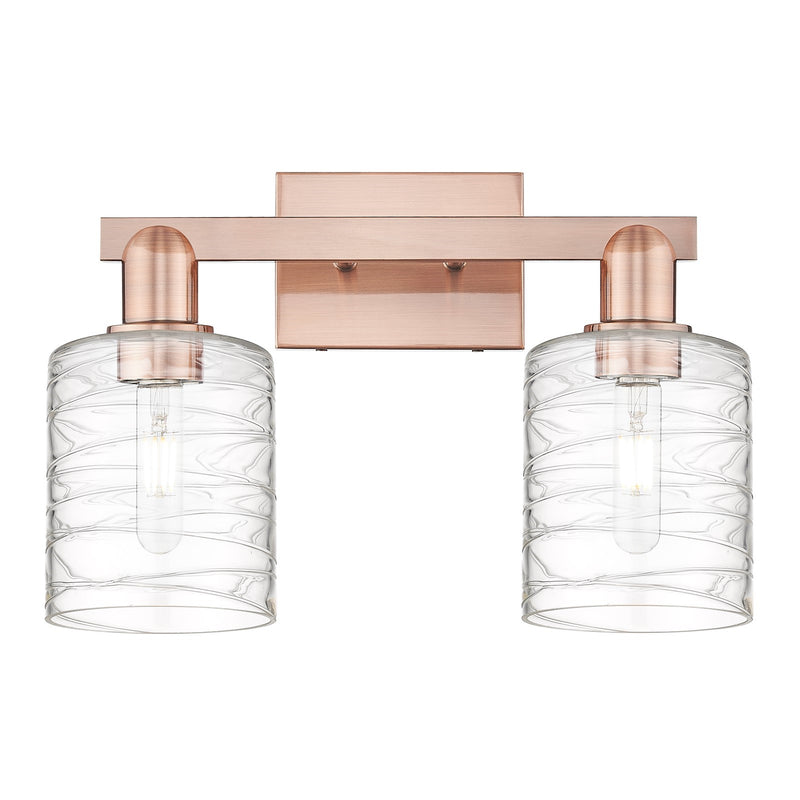 Innovations Cobbleskill 16in 2-Light Bath Vanity | Industrial Antique Copper Steel and Deco Swirl Glass | Bathroom Vanity Light | Model 716-2W-AC-G1113