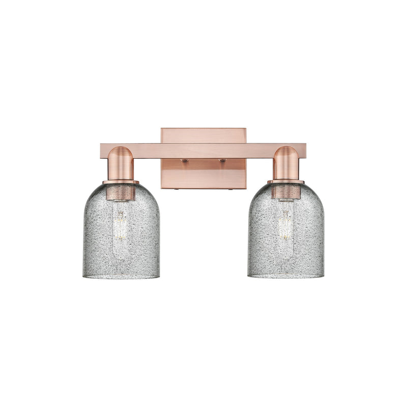 Innovations Lighting Caledonia 16in 2-Light Bath Vanity Light | Industrial Antique Copper Steel and Charcoal Glass | Bathroom | Model 716-2W-AC-G257