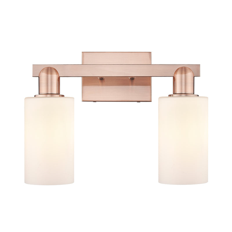 Innovations Clymer 15in 2-Light Bath Vanity Light | Industrial Antique Copper Steel and Matte White Glass | Bathroom Vanity | 14.88 | Model 716-2W-AC-G801