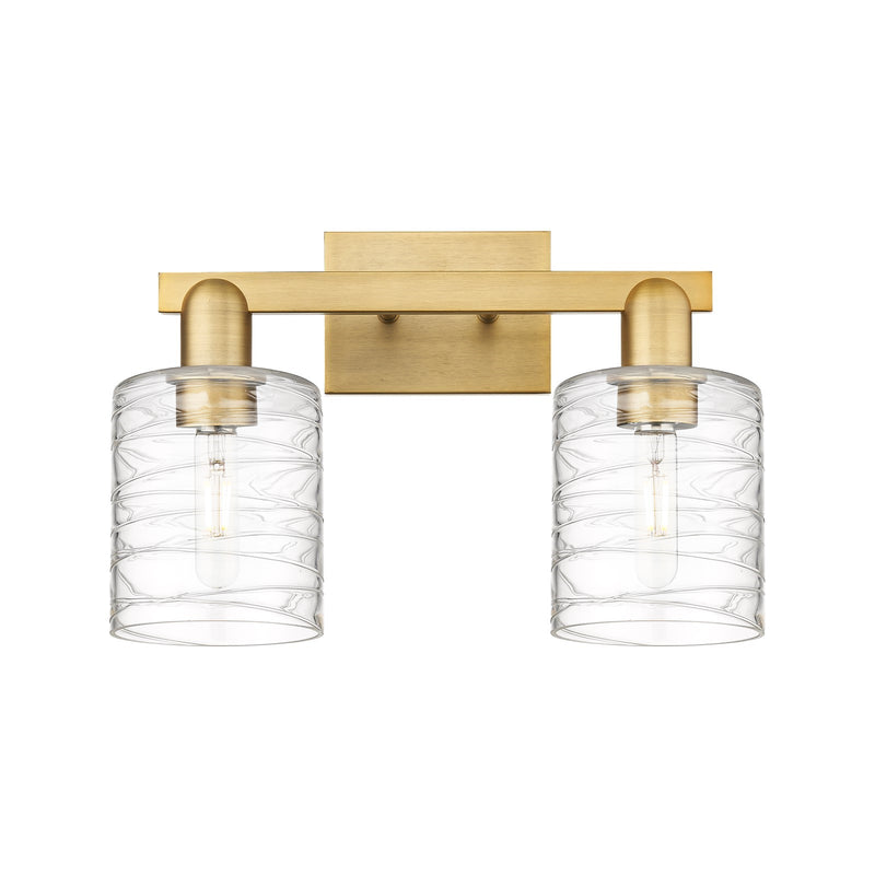 Innovations Cobbleskill 16in 2-Light Bath Vanity Light | Industrial Brushed Brass Steel and Deco Swirl Clear Glass | Bathroom | Model 716-2W-BB-G1113