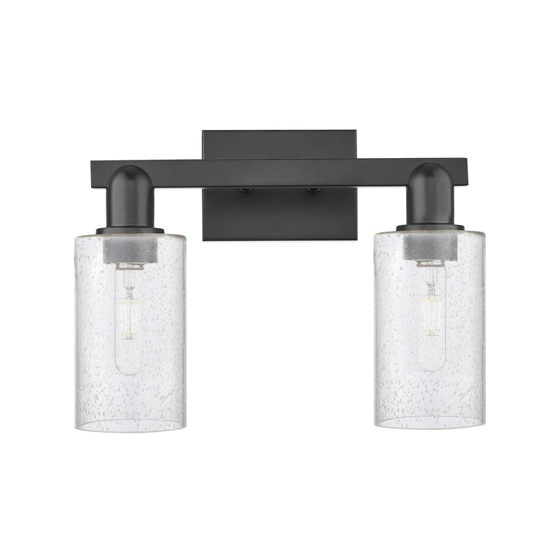 Innovations Clymer 15in 2-Light Bath Vanity Light | Industrial Matte Black Steel and Seedy Glass | Bathroom Vanity | 14.88 x 10.62 | Model 716-2W-BK-G804