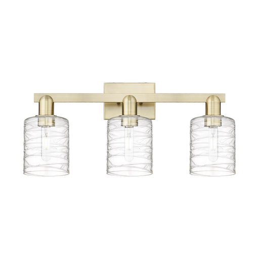 Innovations Cobbleskill 24in 3-Light Bath Vanity Light | Industrial Antique Brass and Deco Swirl Clear Glass | Bathroom Vanity | Model 716-3W-AB-G1113
