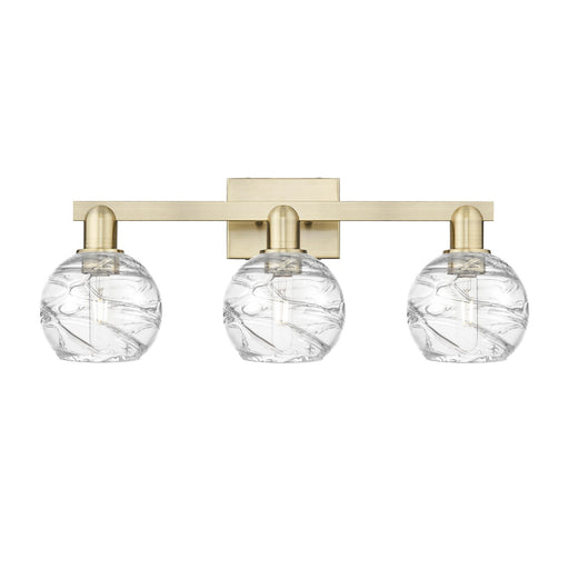 Innovations Athens Deco Swirl 26in 3-Light Bath Vanity Light | Industrial Antique Brass and Clear Glass | Bathroom Vanity | Model 716-3W-AB-G1213-6CL