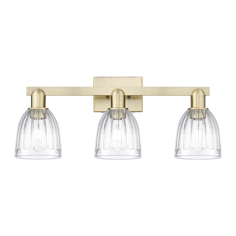Innovations Brookfield 25in 3-Light Bath Vanity Light | Industrial Antique Brass Steel and Clear Ribbed Glass | Bathroom Vanity | Model 716-3W-AB-G442