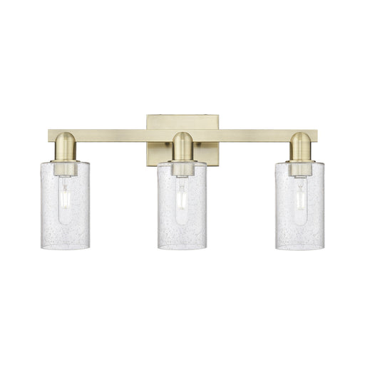 Innovations Clymer 23in 3-Light Bath Vanity Light | Industrial Antique Brass Steel and Seedy Glass | Bathroom Vanity | 22.88 x | Model 716-3W-AB-G804