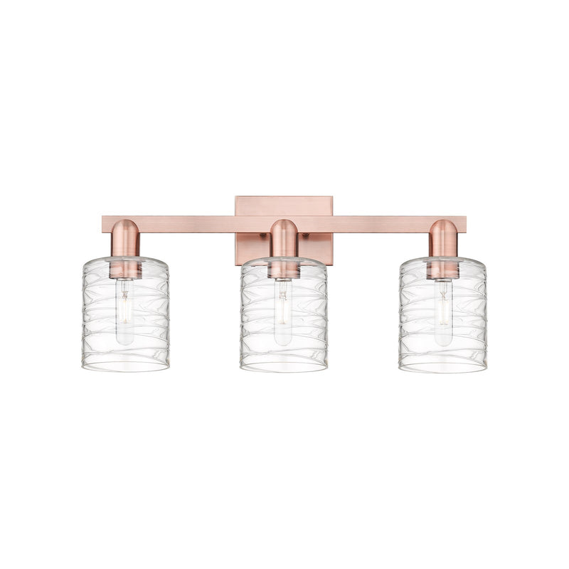 Innovations Cobbleskill 24in 3-Light Bath Vanity | Industrial Antique Copper Steel and Deco Swirl Glass | Bathroom Vanity Light | Model 716-3W-AC-G1113
