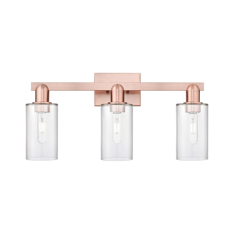 Innovations Clymer 23in 3-Light Bath Vanity Light | Industrial Antique Copper Steel and Clear Glass | Bathroom Vanity & Powder Room | Model 716-3W-AC-G802
