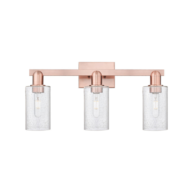 Innovations Clymer 23in 3-Light Bath Vanity Light | Industrial Antique Copper Steel and Seedy Glass | Bathroom Vanity | 22.88 x | Model 716-3W-AC-G804