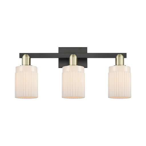 Innovations Hadley 24in 3-Light Bath Vanity | Industrial Black Antique Brass and Matte White Ribbed Glass | Bathroom Vanity Light | Model 716-3W-BAB-G341