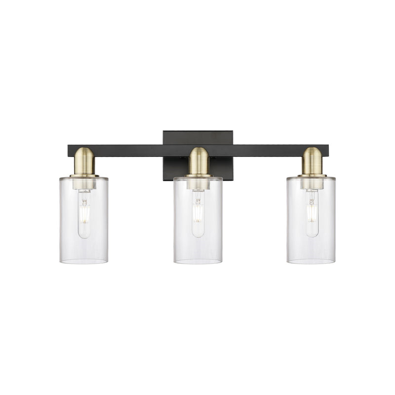 Innovations Clymer 23in 3-Light Bath Vanity | Industrial Black Antique Brass and Clear Glass | Bathroom Vanity Light | 22.88 x | Model 716-3W-BAB-G802