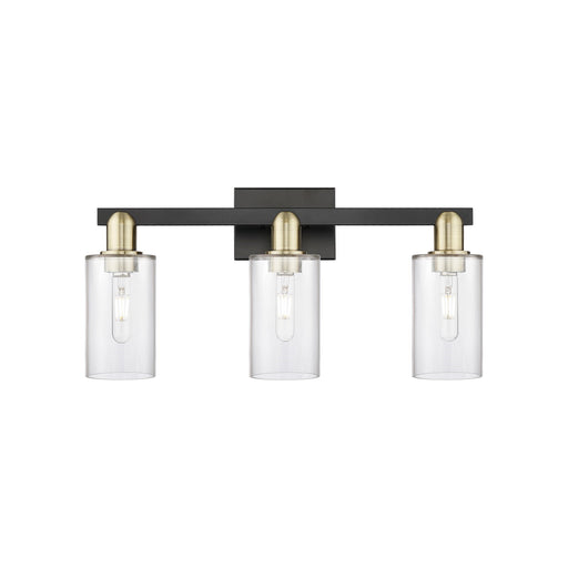 Innovations Clymer 23in 3-Light Bath Vanity | Industrial Black Antique Brass and Clear Glass | Bathroom Vanity Light | 22.88 x | Model 716-3W-BAB-G802