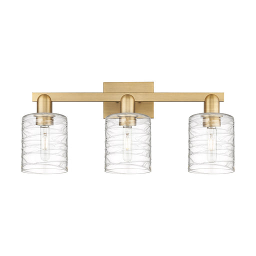 Innovations Cobbleskill 24in 3-Light Bath Vanity Light | Industrial Brushed Brass Steel and Deco Swirl Clear Glass | Bathroom | Model 716-3W-BB-G1113