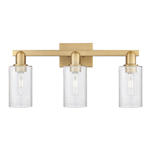 Innovations Clymer 23in 3-Light Bath Vanity Light | Industrial Brushed Brass Steel and Seedy Glass | Bathroom Vanity | 22.88 x | Model 716-3W-BB-G804