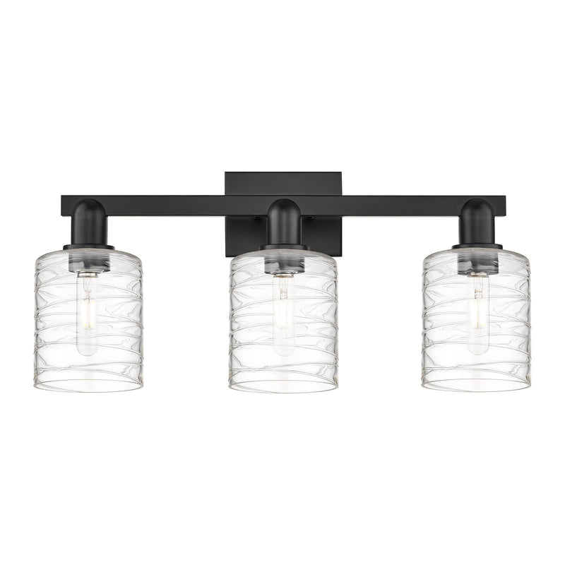 Innovations Cobbleskill 24in 3-Light Bath Vanity Light | Industrial Matte Black Steel and Deco Swirl Clear Glass | Bathroom Vanity | Model 716-3W-BK-G1113