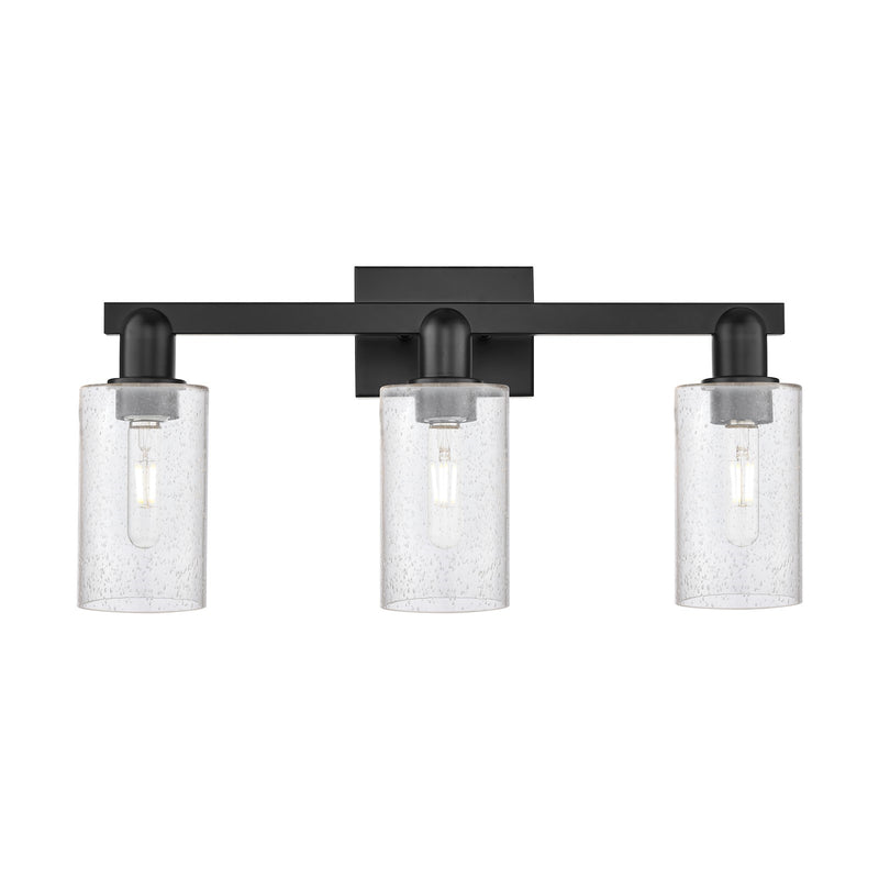 Innovations Clymer 23in 3-Light Bath Vanity Light | Industrial Matte Black Steel and Seedy Glass | Bathroom Vanity | 22.88 x 10.62 | Model 716-3W-BK-G804