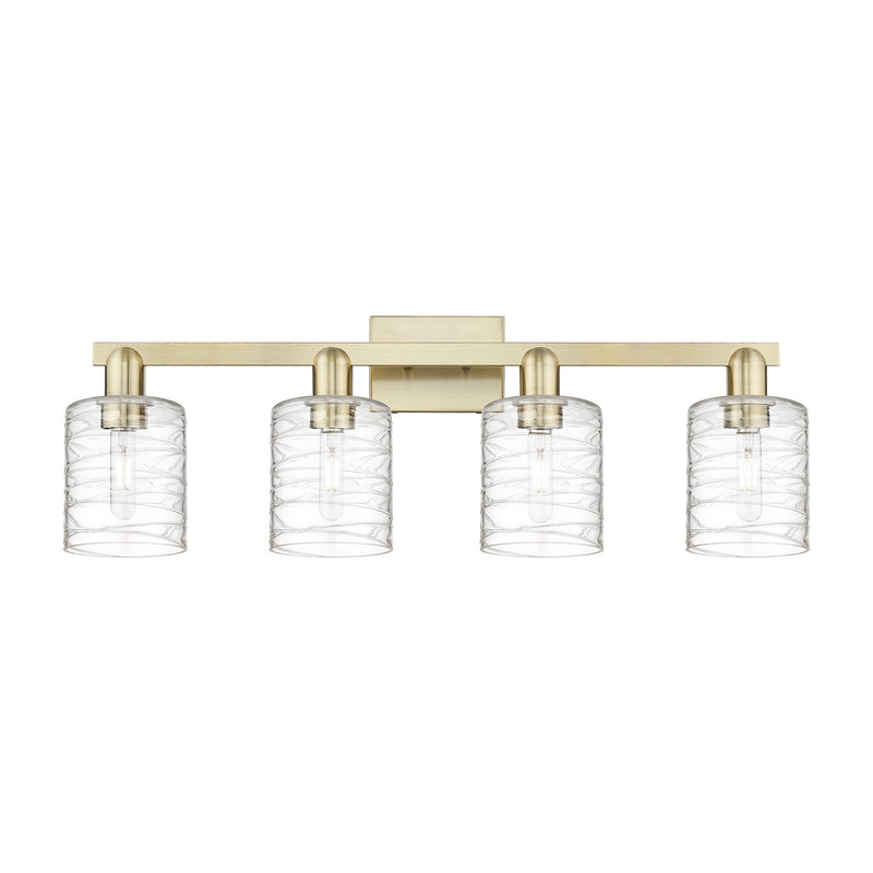 Innovations Cobbleskill 32in 4-Light Bath Vanity Light | Industrial Antique Brass Steel and Deco Swirl Clear Glass | Bathroom | Model 716-4W-AB-G1113
