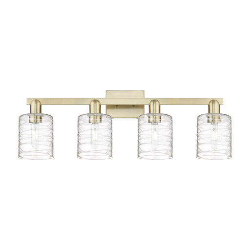 Innovations Cobbleskill 32in 4-Light Bath Vanity Light | Industrial Antique Brass Steel and Deco Swirl Clear Glass | Bathroom | Model 716-4W-AB-G1113