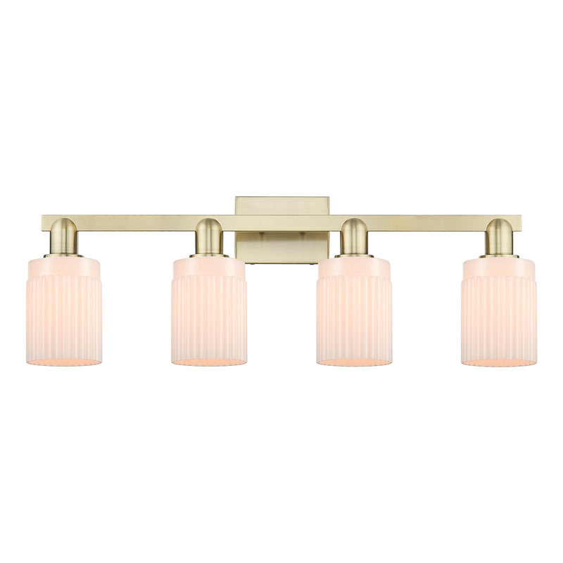 Innovations Hadley 32in 4-Light Bath Vanity Light | Industrial Antique Brass and Matte White Ribbed Glass | Bathroom Vanity | Model 716-4W-AB-G341