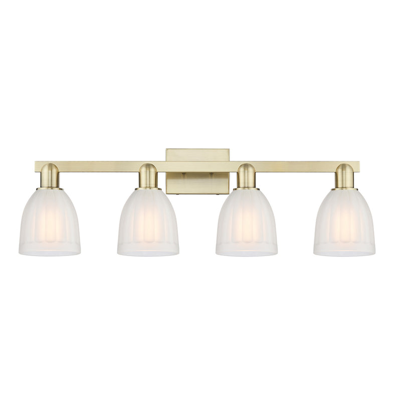 Innovations Brookfield 33in 4-Light Bath Vanity Light | Industrial Antique Brass and White Frosted Ribbed Glass | Bathroom Vanity | Model 716-4W-AB-G441