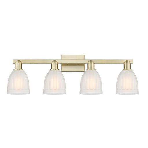 Innovations Brookfield 33in 4-Light Bath Vanity Light | Industrial Antique Brass and White Frosted Ribbed Glass | Bathroom Vanity | Model 716-4W-AB-G441