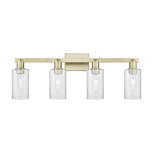 Innovations Clymer 31in 4-Light Bath Vanity Light | Industrial Antique Brass Steel and Seedy Glass | Bathroom Vanity | Model 716-4W-AB-G804
