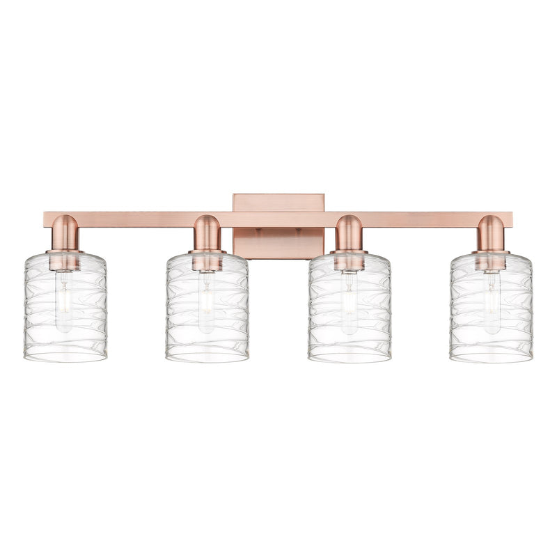 Innovations Cobbleskill 32in 4-Light Bath Vanity | Industrial Antique Copper Steel and Deco Swirl Glass | Bathroom Vanity | Model 716-4W-AC-G1113