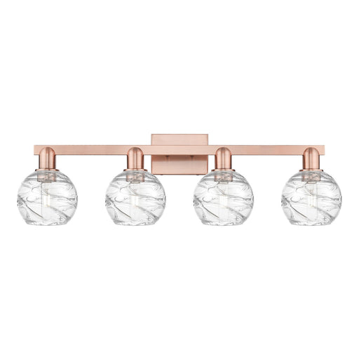 Innovations Athens Deco Swirl 36in 4-Light Bath Vanity Light | Industrial Antique Copper and Clear Deco Swirl Glass | Damp | Model 716-4W-AC-G1213-6CL