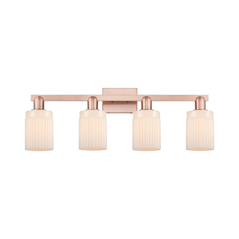 Innovations Hadley 32in 4-Light Bath Vanity Light | Industrial Antique Copper and Matte White Ribbed Glass | Bathroom Vanity | Model 716-4W-AC-G341