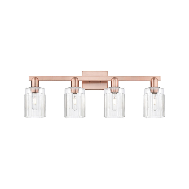 Innovations Hadley 32in 4-Light Bath Vanity Light | Industrial Antique Copper Steel and Clear Ribbed Glass | Damp Rated Bathroom | Model 716-4W-AC-G342