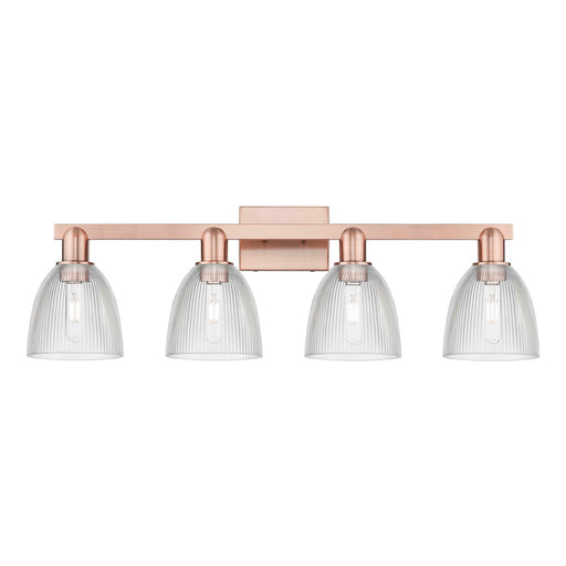 Innovations Castile 33in 4-Light Bath Vanity Light | Industrial Antique Copper and Clear Glass | Damp Rated Bathroom Vanity | Model 716-4W-AC-G382