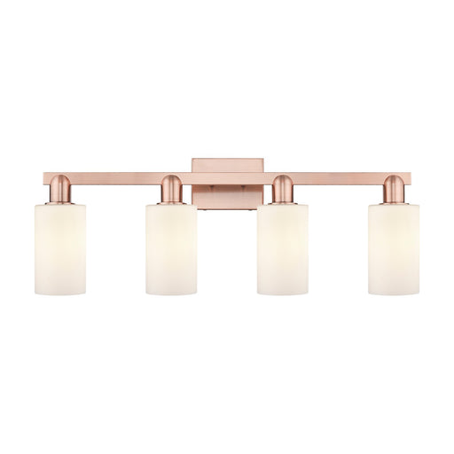 Innovations Clymer 31in 4-Light Bath Vanity Light | Industrial Antique Copper and Matte White Glass | Bathroom Vanity | Model 716-4W-AC-G801