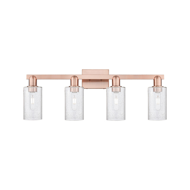 Innovations Clymer 31in 4-Light Bath Vanity Light | Industrial Antique Copper Steel and Seedy Glass | Bathroom Vanity | Model 716-4W-AC-G804