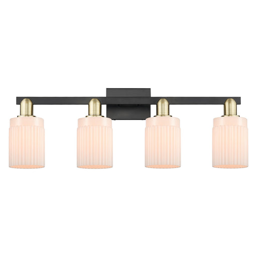Innovations Hadley 32in 4-Light Bath Vanity | Industrial Black Antique Brass and Matte White Ribbed Glass | Bathroom Vanity Light | Model 716-4W-BAB-G341