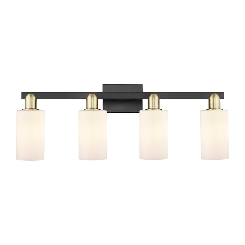 Innovations Clymer 31in 4-Light Bath Vanity | Industrial Black Antique Brass Steel and Matte White Glass | Bathroom Vanity Light | Model 716-4W-BAB-G801