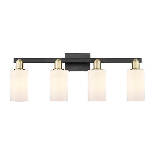 Innovations Clymer 31in 4-Light Bath Vanity | Industrial Black Antique Brass Steel and Matte White Glass | Bathroom Vanity Light | Model 716-4W-BAB-G801