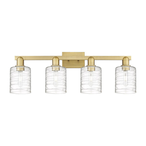 Innovations Cobbleskill 32in 4-Light Bath Vanity Light | Industrial Brushed Brass Steel and Deco Swirl Clear Glass | Bathroom | Model 716-4W-BB-G1113