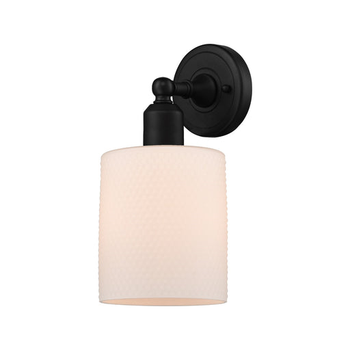 Innovations Cobbleskill 5in 1-Light Wall Sconce | Industrial Matte Black Steel and Matte White Glass | Bedroom & Hallway Accent | Model 900-1W-BK-G111