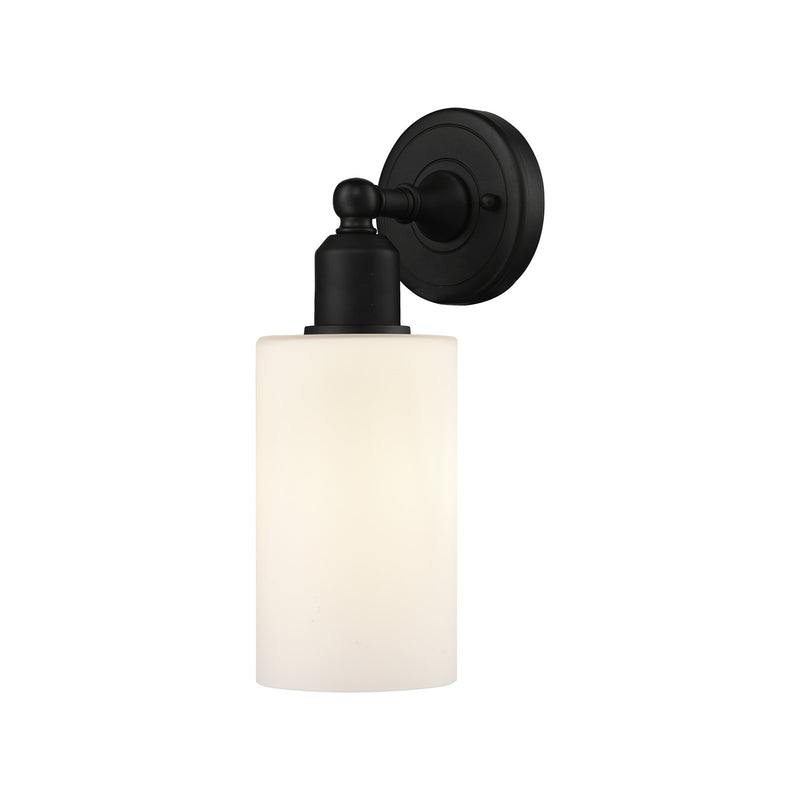 Innovations Clymer 1-Light 4in Wall Sconce | Industrial Matte Black Steel and Cast Brass with Matte White Glass | Damp Rated | Model 900-1W-BK-G801