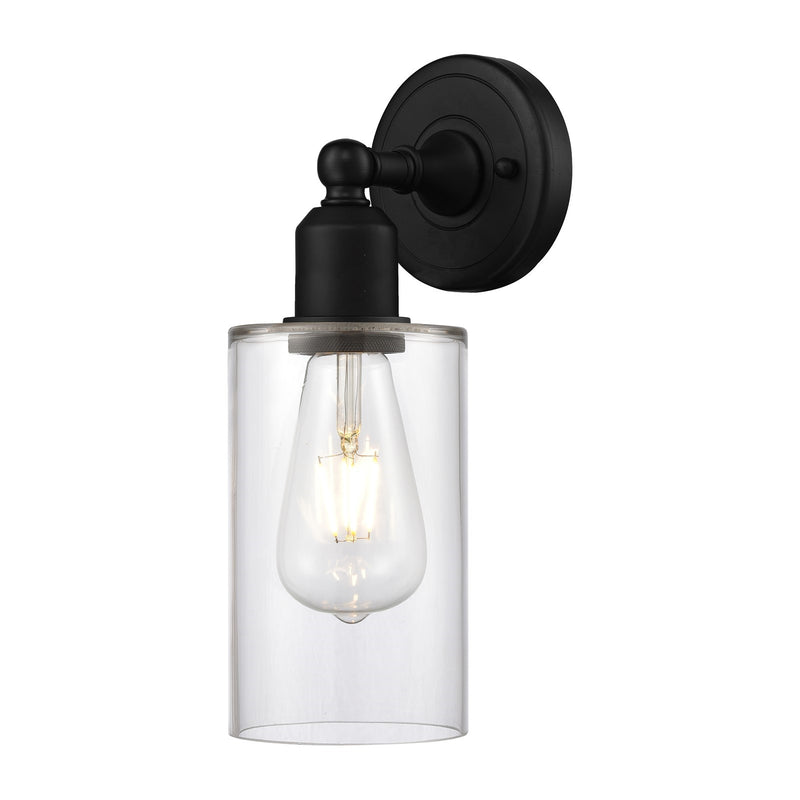 Innovations Clymer 1-Light 4in Wall Sconce | Industrial Matte Black Steel and Clear Glass | Damp Rated Hallway & Bathroom Accent | Model 900-1W-BK-G802