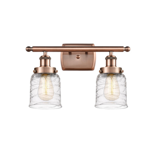 Innovations Bell 16in 2-Light Bath Vanity Light | Industrial Antique Copper and Clear Deco Swirl Glass | Bathroom Vanity | Model 916-2W-AC-G513-LED