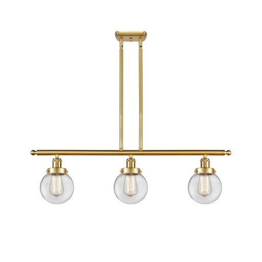 Innovations Beacon 36in 3-Light Island Light | Modern Transitional Satin Gold Steel and Clear Glass | Kitchen Island & Dining | Model 916-3I-SG-G202-6