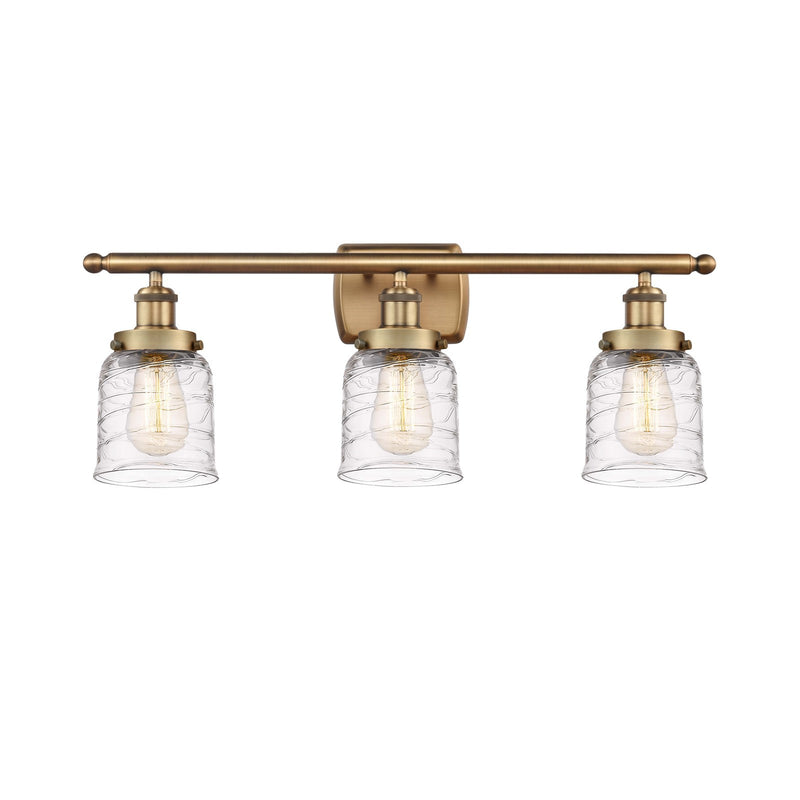 Innovations Bell 26in 3-Light Bath Vanity Light | Brushed Brass Steel and Clear Deco Swirl Glass | Bathroom Vanity | 26 x 12 in | Model 916-3W-BB-G513