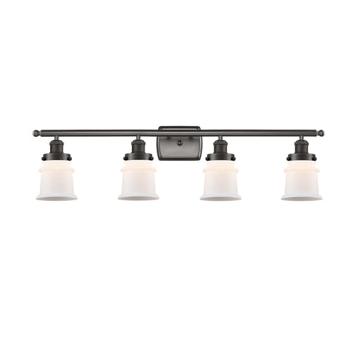 Innovations Canton 35.25in 4-Light Bath Vanity Light | Oil Rubbed Bronze Steel and Matte White Frosted Glass Bell/Urn Shade | Model 916-4W-OB-G181S