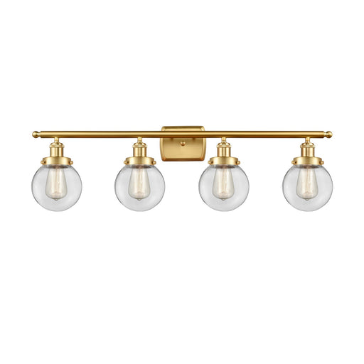 Innovations Beacon 36in 4-Light Bath Vanity Light | Modern Transitional Satin Gold Steel and Clear Glass | Bathroom Vanity & | Model 916-4W-SG-G202-6