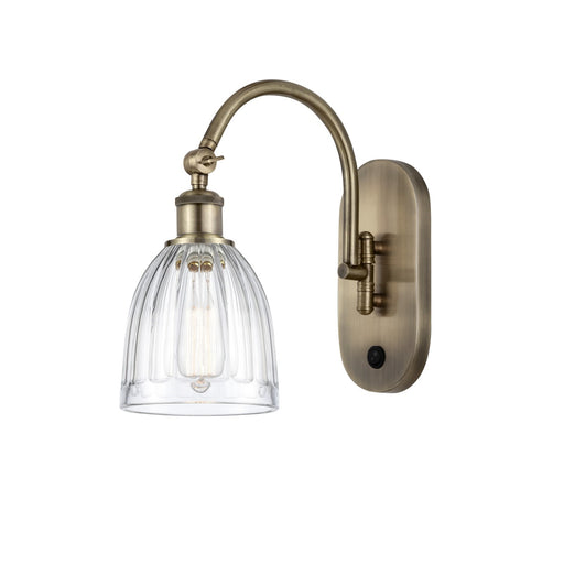 Innovations Brookfield 6in 1-Light Wall Sconce | Industrial Antique Brass Steel and Clear Ribbed Glass | Hallway & Bathroom Accent | Model 918-1W-AB-G442
