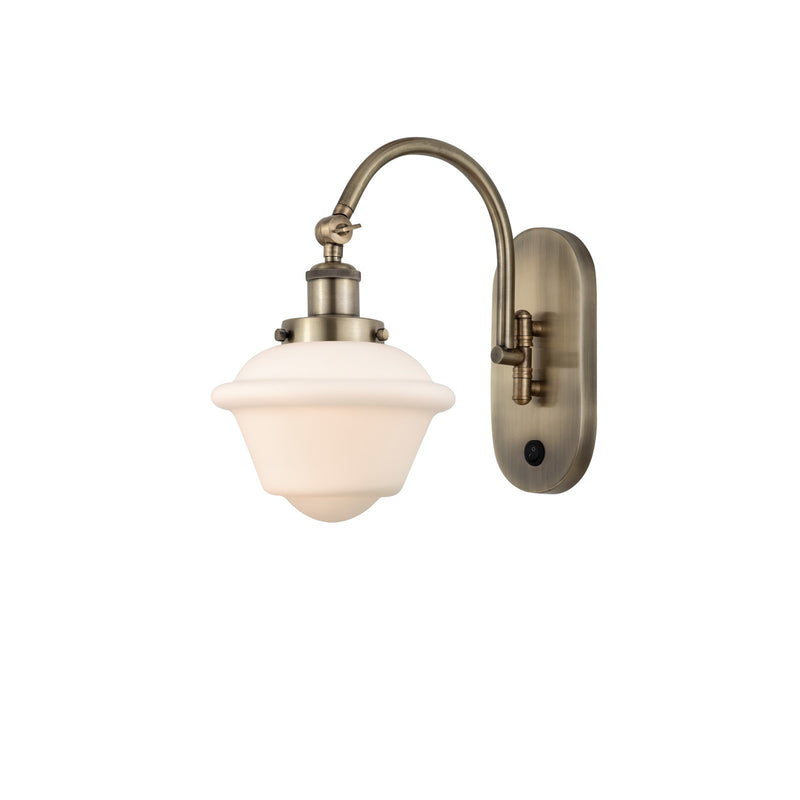 Innovations Oxford 8in 1-Light Swing Arm Sconce | Traditional Antique Brass and Matte White Frosted Glass | Bedroom & Living Room | Model 918-1W-AB-G531