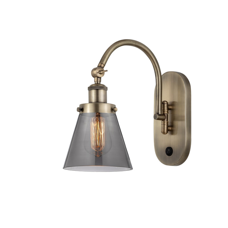 Innovations Cone 6.25in 1-Light Swing Arm Sconce | Industrial Antique Brass and Light Smoke Glass | Bedroom & Hallway Accent | Model 918-1W-AB-G63-LED