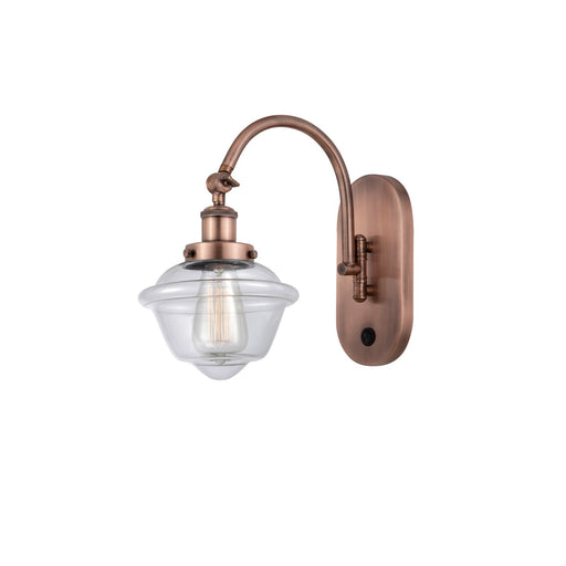 Innovations Oxford 7.5in 1-Light Swing Arm Sconce | Traditional Antique Copper Steel and Clear Glass | Bedroom & Living Room | Model 918-1W-AC-G532